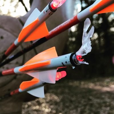 broken nock on arrow in a tight group in a deer target